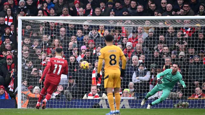 Mohamed Salah converts penalty versus Wolves during the Premier League 2024/25 Season