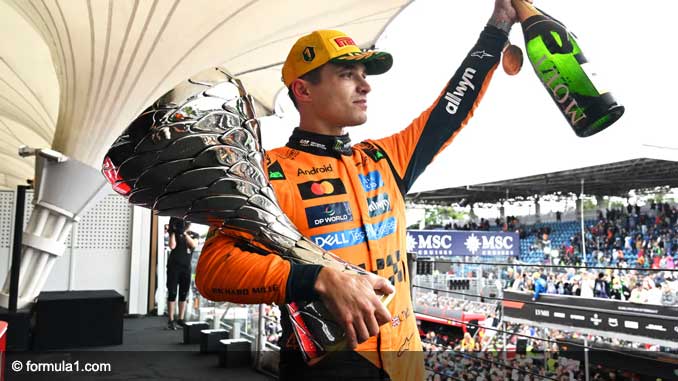 Lando Norris celebrates winning the 2025 Brazilian GP